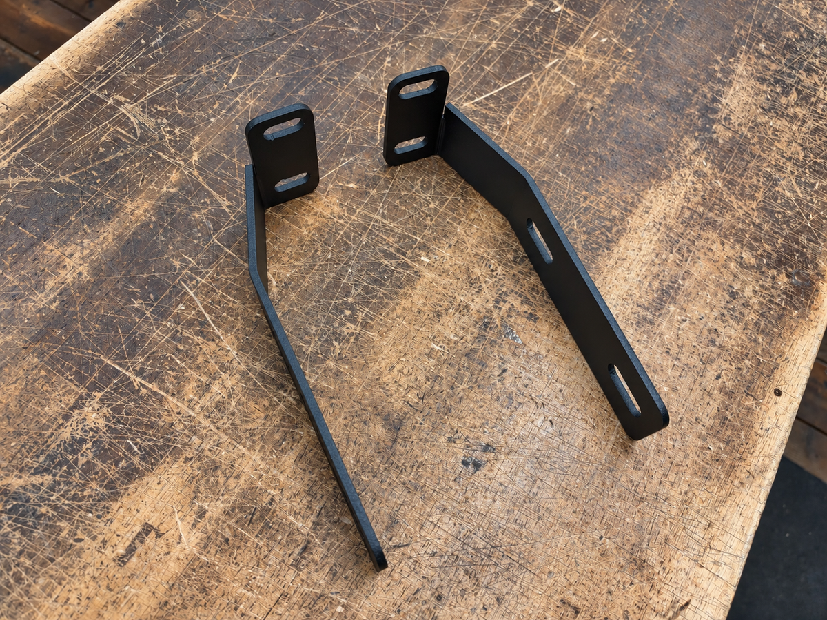 Alternate view of Datsun 280ZX tucked front bumper brackets showing the mounting flanges.